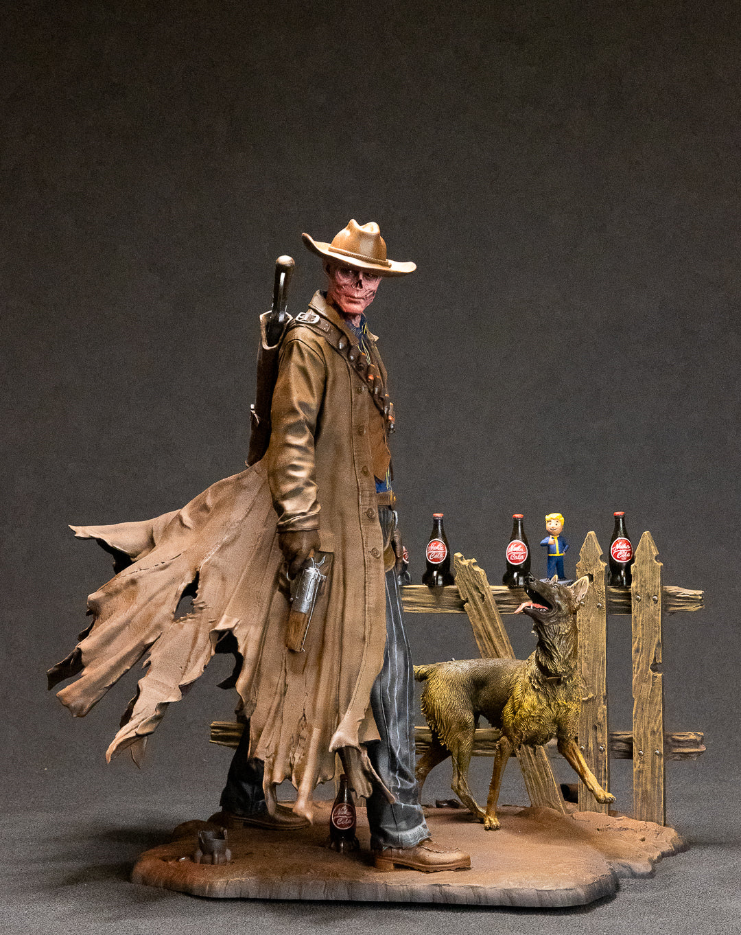 A diorama featuring a resin printed figure of The Ghoul from the Fallout TV series standing next to Dogmeat figurine